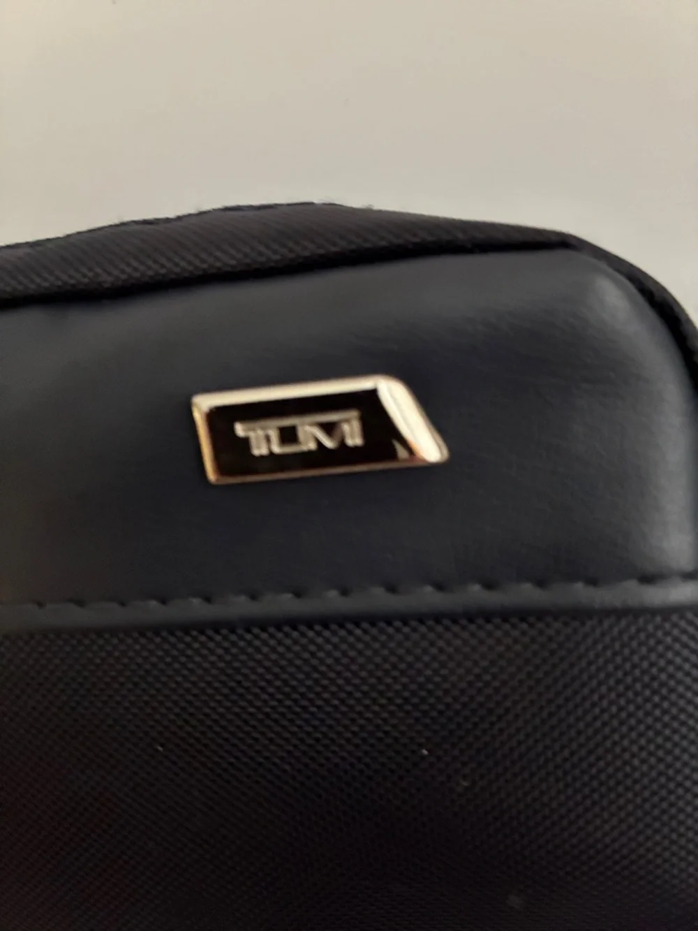 Tumi Black Men's Toiletry Pouch with Gold Accent